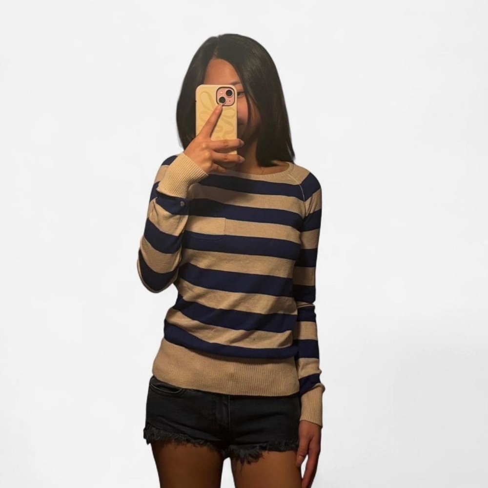 Active cream and navy blue sweater